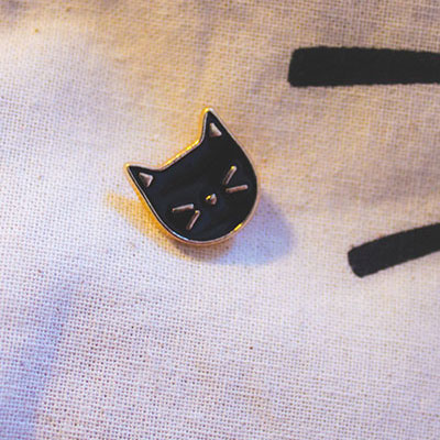 Cat face enamel pin